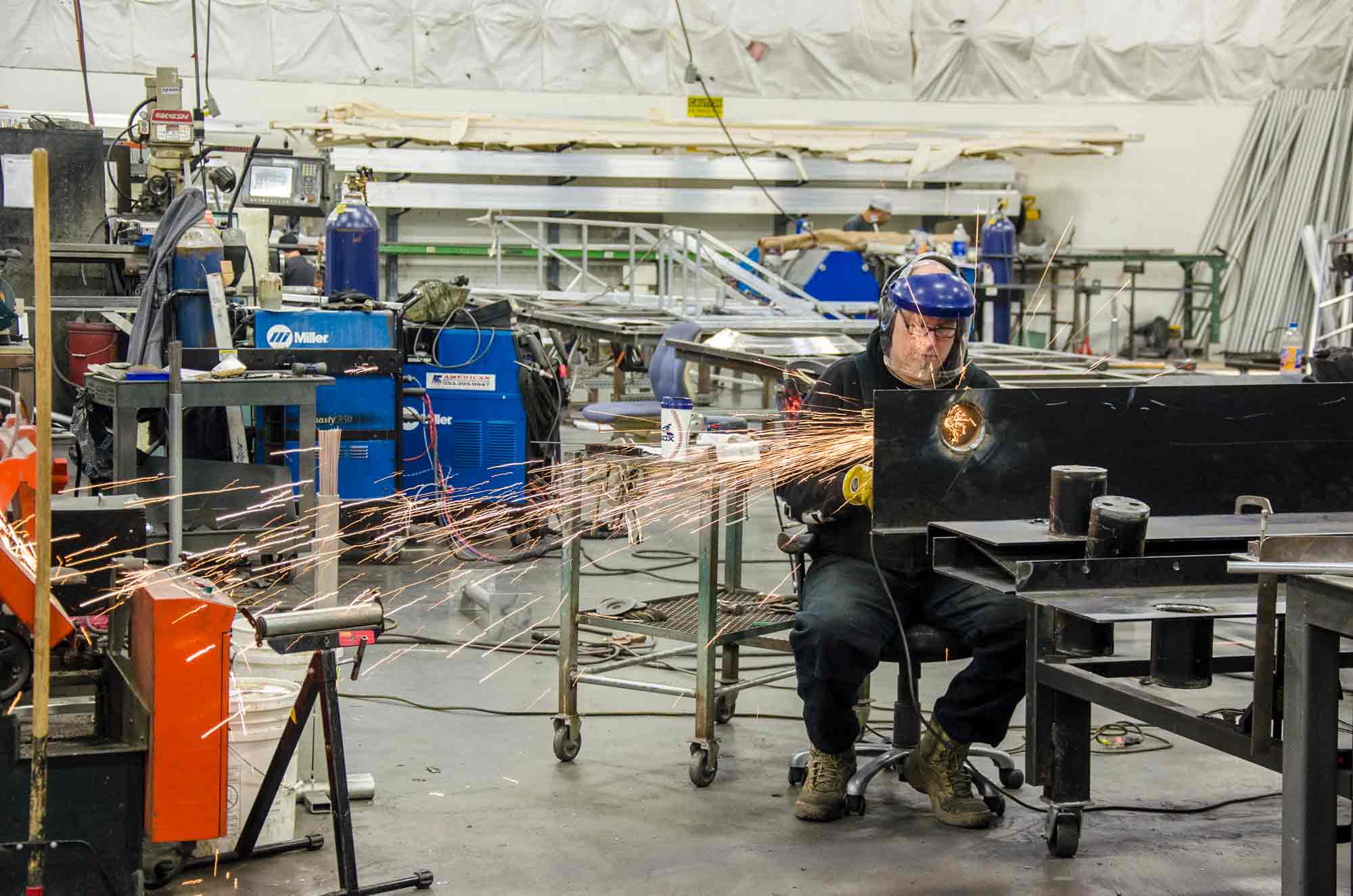 Metal shop employee displays our welding capabilities