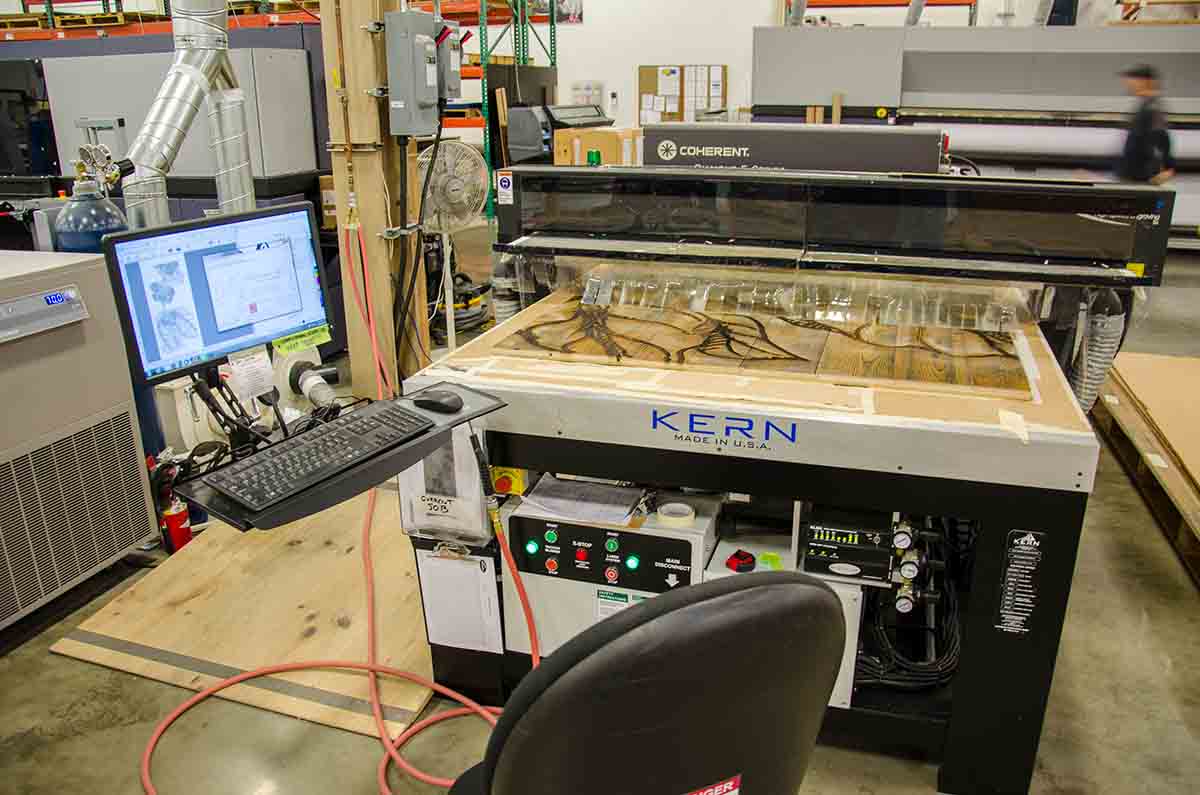 wood burning by laser to develop a retail display at Starbucks Coffee