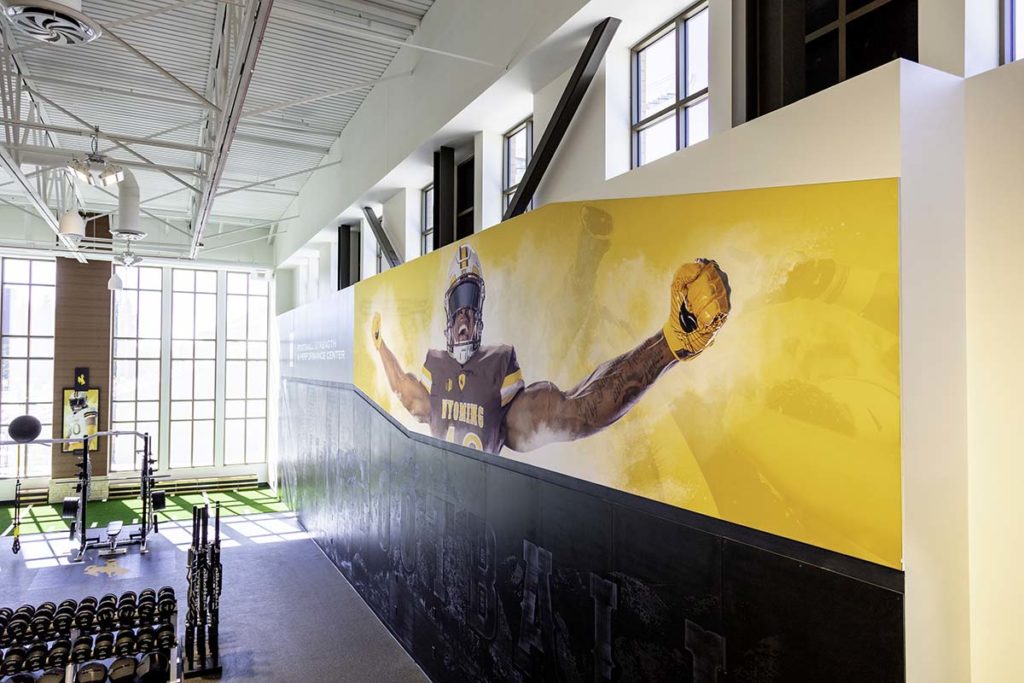 Gym wall mural of a football player
