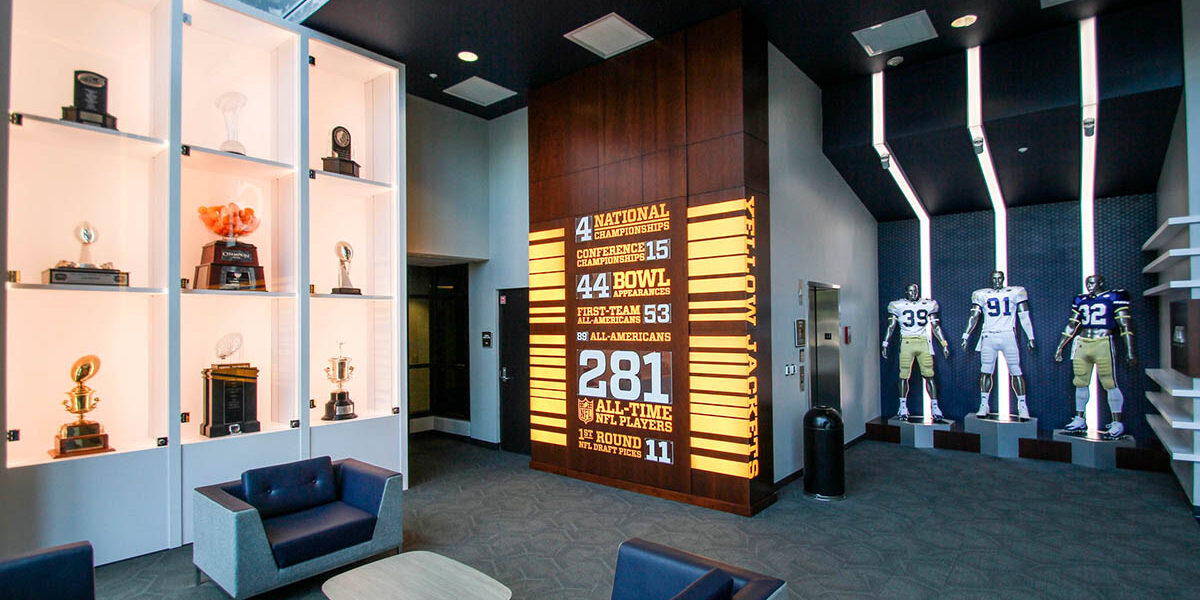 lobby displaying current jerseys for the yellow jackets football team