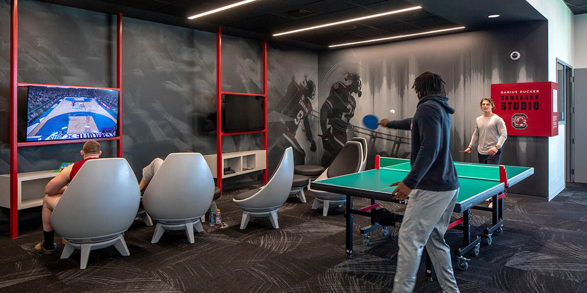 wallcovering mural in a game room for a football team